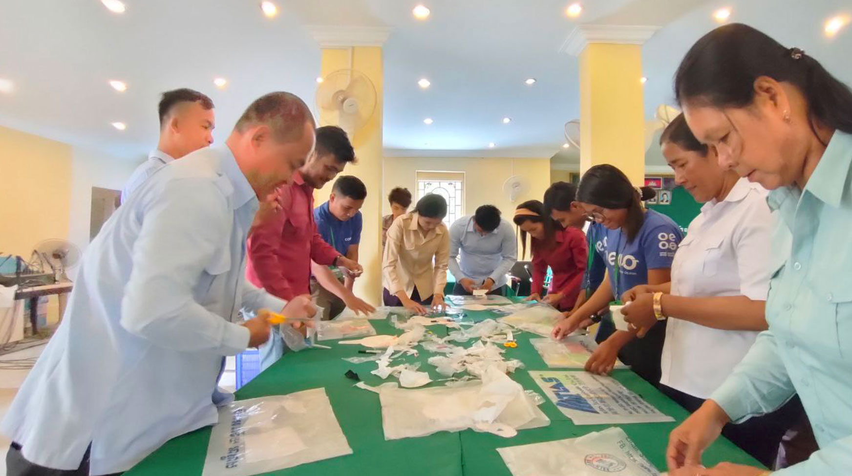 Participants creating products from plastic waste